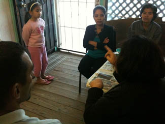 Teacher and parents talking.